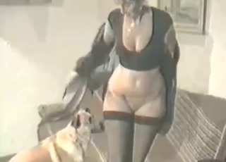 Black stockings MILF fucks dog after work